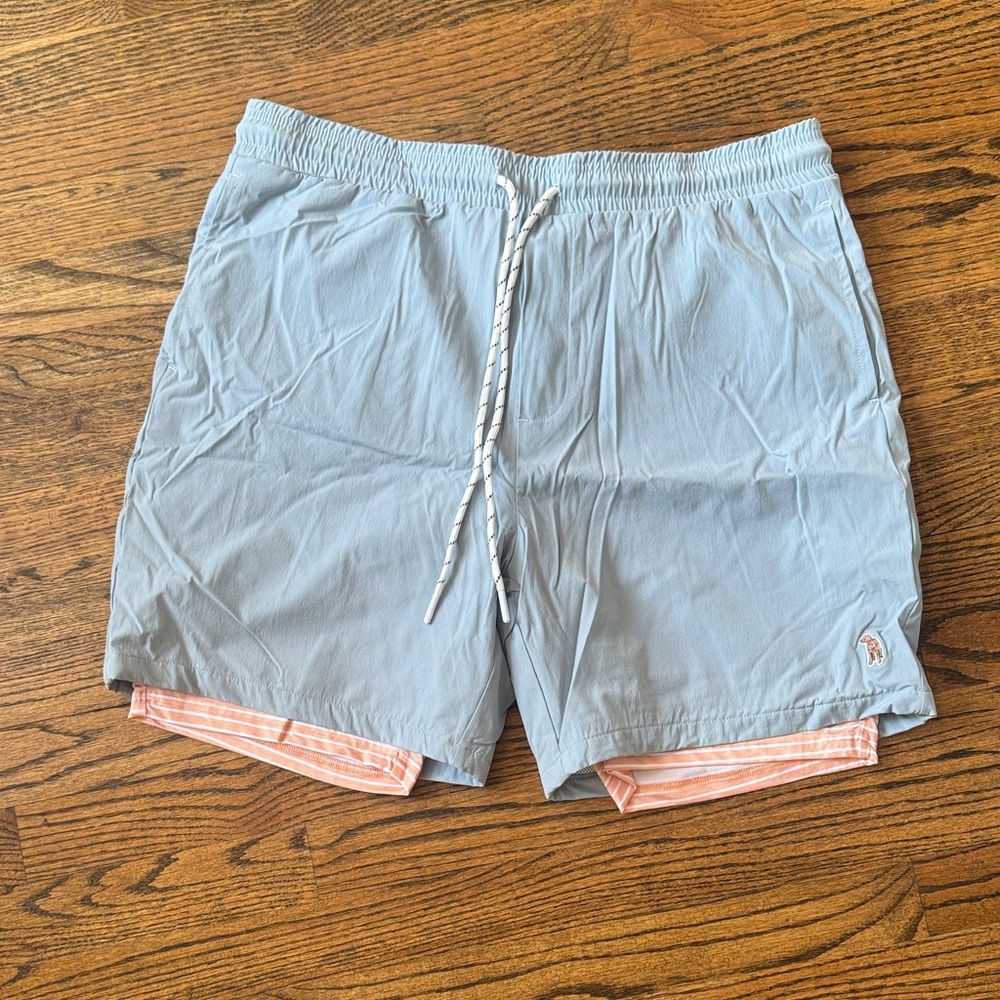 Light Blue Swim Shorts with Pink Lining